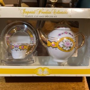 Imperial Porcelain Teapot cup and saucer set